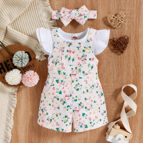 Traje de overol y blusa