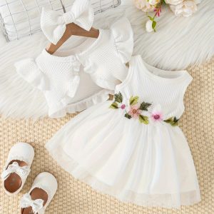 Vestido blanco con flores y torerita